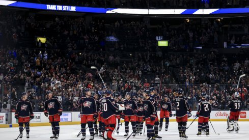 The Columbus Blue Jackets acknowledge the fans after the game against the Tampa Bay Lightning at Nationwide Arena in the home season finale.