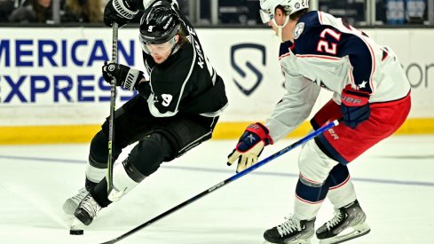 Adam Boqvist defends against Adrian Kempe