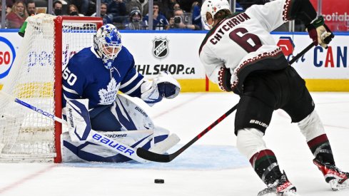 Arizona Coyotes' Jakob Chychrun moves in for a scoring attempt on Toronto Maple Leafs' Erik Kallgren in the second period at Scotiabank Arena.