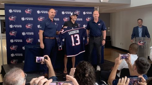Left to right: Brad Larsen, Johnny Gaudreau, Jarmo Kekalainen
