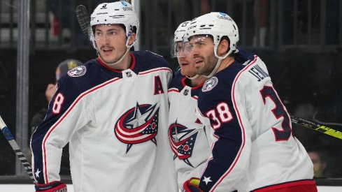 Columbus Blue Jackets center Gustav Nyquist celebrates with Columbus Blue Jackets defenseman Zach Werenski (8) and Columbus Blue Jackets center Boone Jenner after scoring a first period goal.