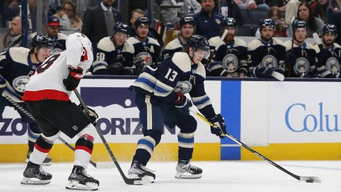 Kent Johnson skates against the Ottawa Senators