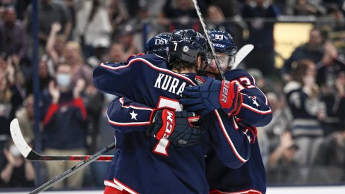 Columbus Blue Jackets' Eric Robinson celebrates a goal with teammates in the first period against the Edmonton Oilers at Nationwide Arena.