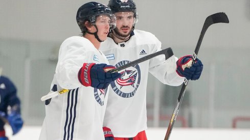 Kent Johnson and Kirill Marchenko chat during CBJ Development Camp