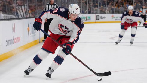 Columbus Blue Jackets' Yegor Chinakhov controls the puck against the Boston Bruins during the second period at TD Garden.