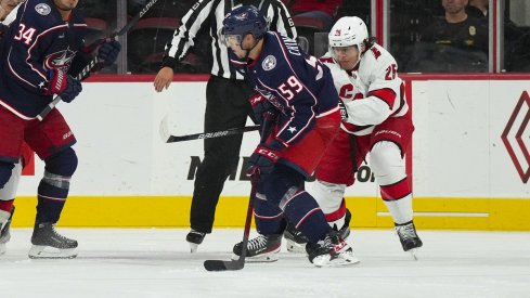 Yegor Chinakhov shoots and scores against the Carolina Hurricanes