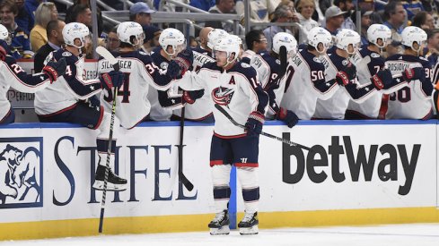 Columbus Blue Jackets' Gustav Nyquist is congratulated by teammates after scoring a goal against the St. Louis Blues during the second period at Enterprise Center.