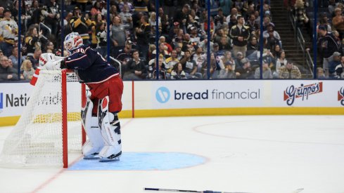 Columbus Blue Jackets' Elvis Merzlikins reacts after allowing a goal against the Pittsburgh Penguins in the third period at Nationwide Arena.