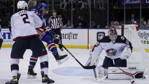 Columbus Blue Jackets' Daniil Tarasov makes a save against the New York Rangers during the second period at Madison Square Garden.