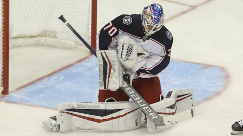 Columbus Blue Jackets' Joonas Korpisalo makes a save against the Pittsburgh Penguins during the second period at PPG Paints Arena.