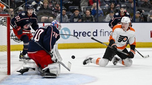 Columbus Blue Jackets' Joonas Korpisalo stops a shot from Philadelphia Flyers' Owen Tippett in the first period at Nationwide Arena.