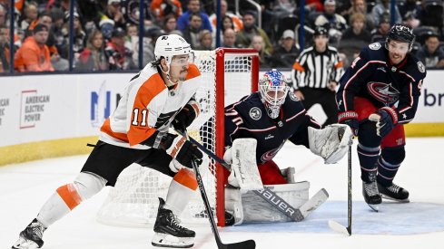 Vladislav Gavrikov protects the net against the Philadelphia Flyers