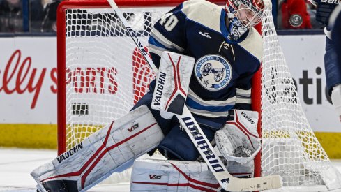 Columbus Blue Jackets' Daniil Tarasov makes a helmet save in the second period against the Florida Panthers at Nationwide Arena.