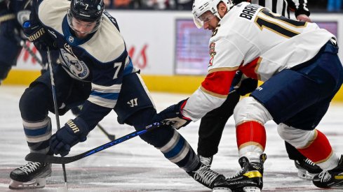 Columbus Blue Jackets' Sean Kuraly wins a face-off against Florida Panthers' Aleksander Barkov in the first period at Nationwide Arena.