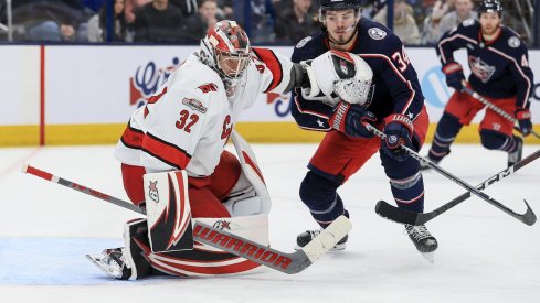 Cole Sillinger tries to hunt down a puck against the Carolina Hurricanes