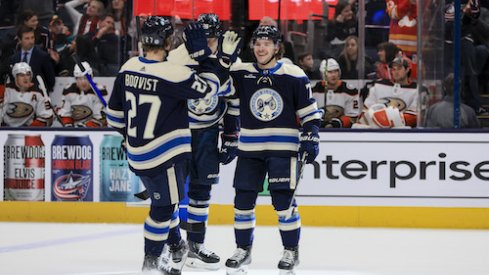 Adam Boqvist, Patrik Laine, and Nick Blankenburg