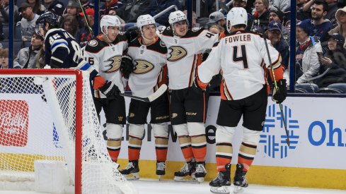 Anaheim Ducks' Cam Fowler celebrates with teammates after scoring a goal against the Columbus Blue Jackets in the second period at Nationwide Arena.