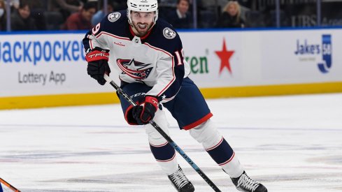 Columbus Blue Jackets forward Liam Foudy skates the puck