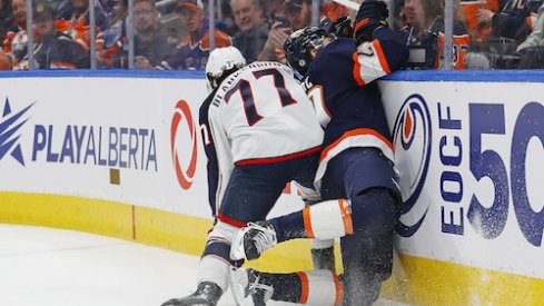 Nick Blankenburg checks Leon Draisaitl in the Blue Jackets vs. Oilers game.