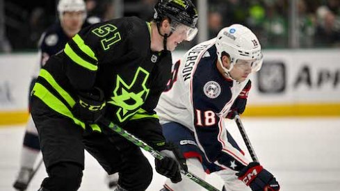 Lane Pederson takes the puck in the Blue Jackets vs. Stars game.