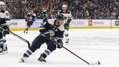 Columbus Blue Jackets' Johnny Gaudreau stick handles in the offensive zone against the Minnesota Wild during the second period at Nationwide Arena.