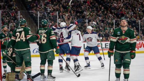 Mathieu Olivier celebrates with his teammates after scoring a goal in the Blue Jackets vs. Wild gam.