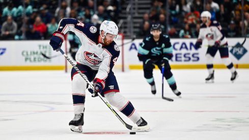 Vladislav Gavrikov handles the puck in the Blue Jackets vs. Kraken game.