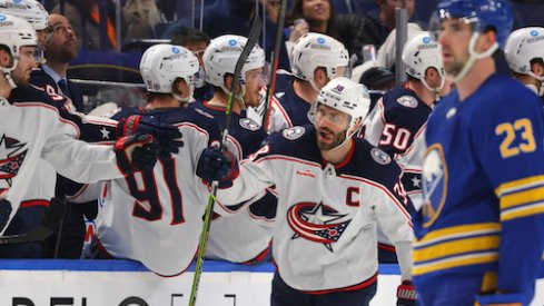 Boone Jenner celebrates after scoring a goal in the Blue Jackets vs. Sabres game.