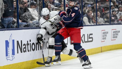 Vladislav Gavrikov checks Anze Kopitar in the Kings vs. Blue Jackets game.
