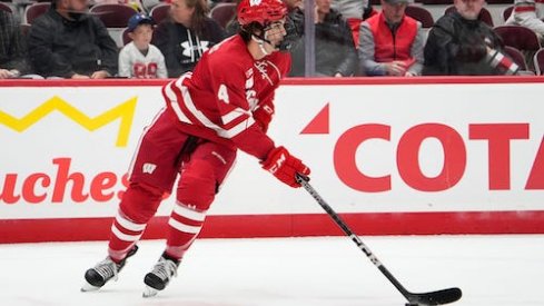 Corson Ceulemans carries the puck in the Wisconsin vs. Ohio State hockey game.