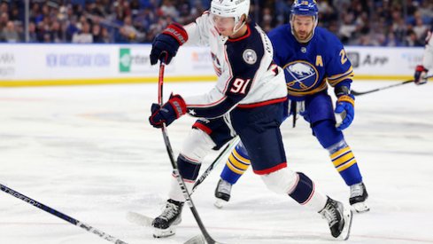 Kent Johnson scores a goal in the Blue Jackets vs. Sabres game.