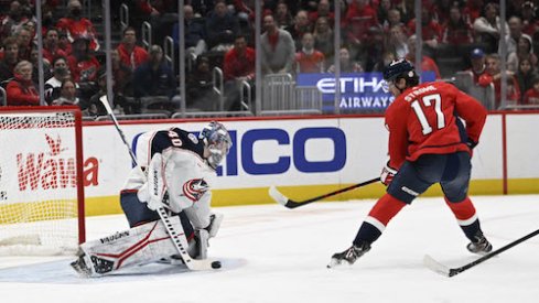 Daniil Tarasov stops Dylan Strome's shot in the Blue Jackets vs. Capitals game.