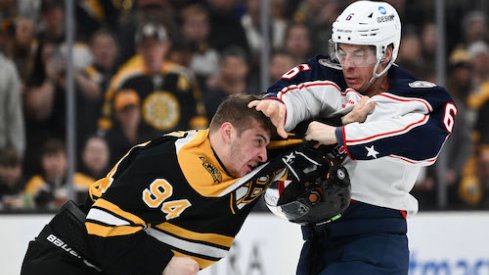 Billy Sweezey and Jakub Lauko fight in the Blue Jackets vs. Bruins game.