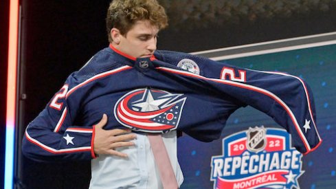 Denton Mateychuk after being selected as the number twelve overall pick to the Columbus Blue Jackets in the first round of the 2022 NHL Draft at Bell Centre.