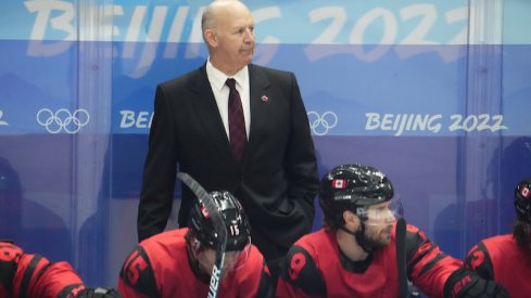 Team Canada head coach Claude Julien against Team USA during the third period in the men's ice hockey preliminary round of the Beijing 2022 Olympic Winter Games at National Indoor Stadium.