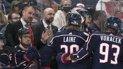 Columbus Blue Jackets head coach Brad Larsen talks with his team during a time out in the third period against the St. Louis Blues at Nationwide Arena.