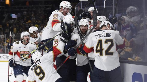 The Florida Panthers celebrate their overtime win over the Boston Bruins in game seven of the first round of the 2023 Stanley Cup Playoffs