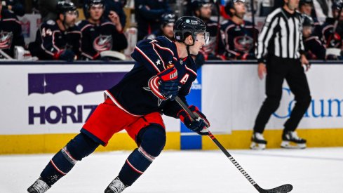 Columbus Blue Jackets' Zach Werenski skates with the puck against the Philadelphia Flyers in the first period at Nationwide Arena.