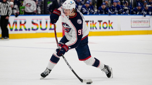 Columbus Blue Jackets forward Kent Johnson (91) shoots the puck against the Toronto Maple Leafs during the second period at Scotiabank Arena.