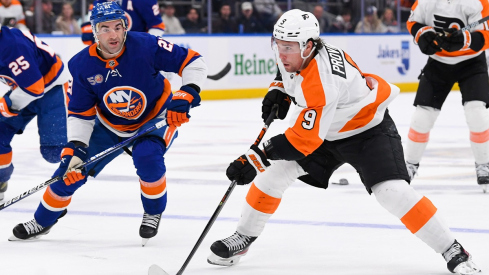 Philadelphia Flyers defenseman Ivan Provorov skates with the puck 