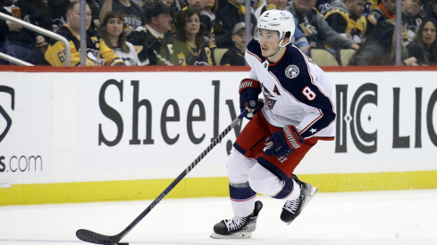 Columbus Blue Jackets defenseman Zach Werenski skates with the puck against the Pittsburgh Penguins