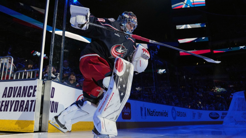 Elvis Merzlikins takes the ice before a game 