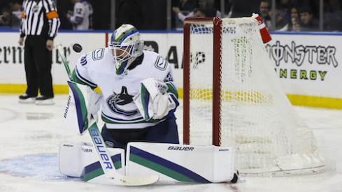 Vancouver Canucks goaltender Spencer Martin (30) makes a save against the New York Rangers during the second period of a game at Madison Square Garden.