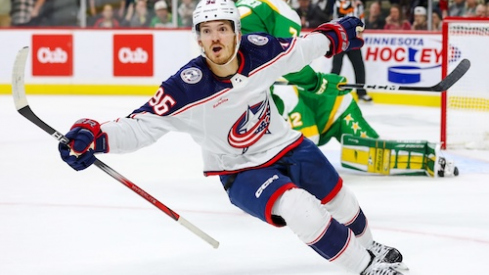 Columbus Blue Jackets center Jack Roslovic (96) celebrates his game winning goal against the Minnesota Wild during overtime at Xcel Energy Center.