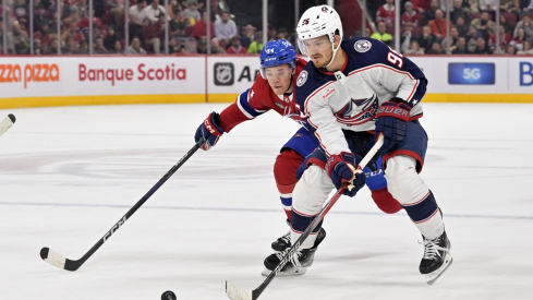 Jack Roslovic skates with the puck against the Montreal Canadiens 