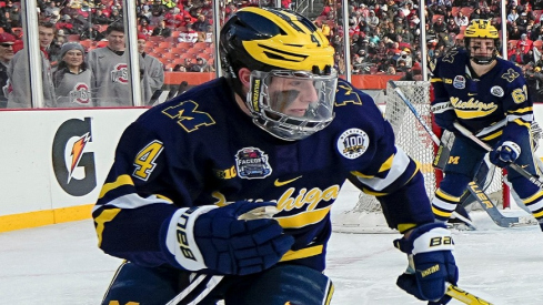 Michigan Wolverines forward Gavin Brindley (4) skates during the Faceoff on the Lake outdoor NCAA men s hockey game against the Ohio State Buckeyes at FirstEnergy Stadium.