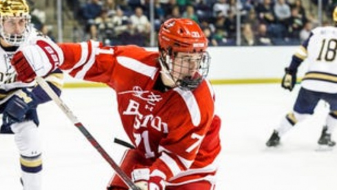 Boston University forward Macklin Celebrini (71) skates with the puck during the Boston University-Notre Dame NCAA hockey game on Saturday, October 21, 2023, at Compton Family Ice Arena in South Bend, Indiana.