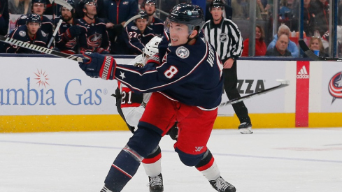 Columbus Blue Jackets defenseman Zach Werenski (8) follows though on a shot against the Ottawa Senators during the second period at Nationwide Arena.