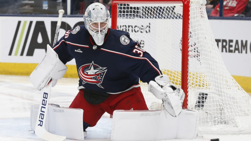 Columbus Blue Jackets' Spencer Martin makes a pad save against the Boston Bruins during the first period at Nationwide Arena.