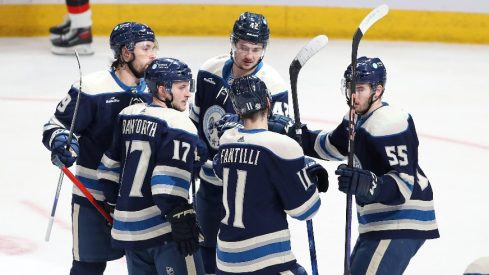 Columbus Blue Jackets center Alexandre Texier (42) celebrates his goal with teammates during the third period against the New Jersey Devils at Nationwide Arena.